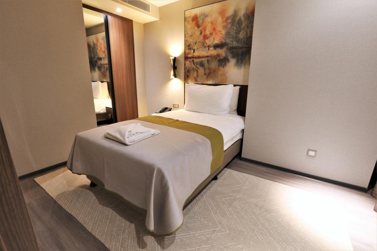 Limak Skopje Luxury Hotel 外观 照片 A bedroom in a hotel